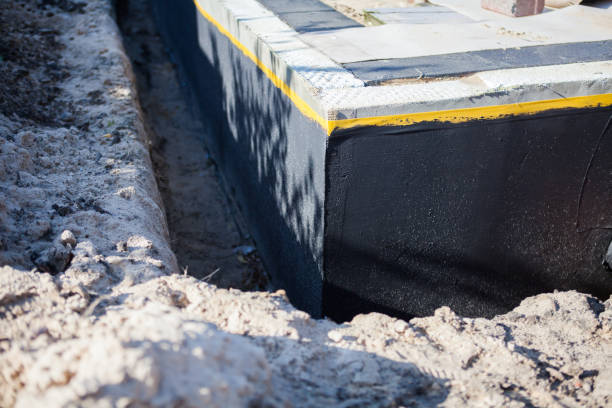 Professional Waterproofing technician working in Weston, NJ